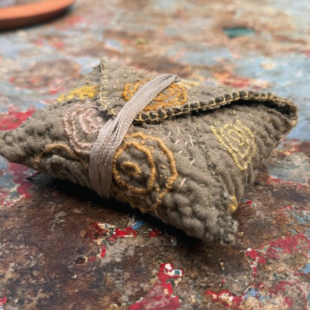 THE TOUCHSTONE POUCH: Create a quilted envelope with ancient-inspired spirals and mindful embroidered markings.