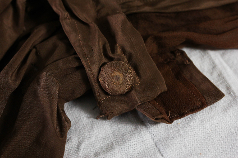 button at waist